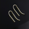 Picture of VICTORIA CRUZ Eunoia zircons arc earrings in gold
